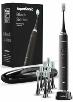 AquaSonic Black Series toothbrush with multiple brush heads and travel case.